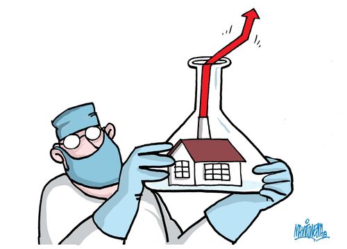 Scientist with model of a house in a test tube.