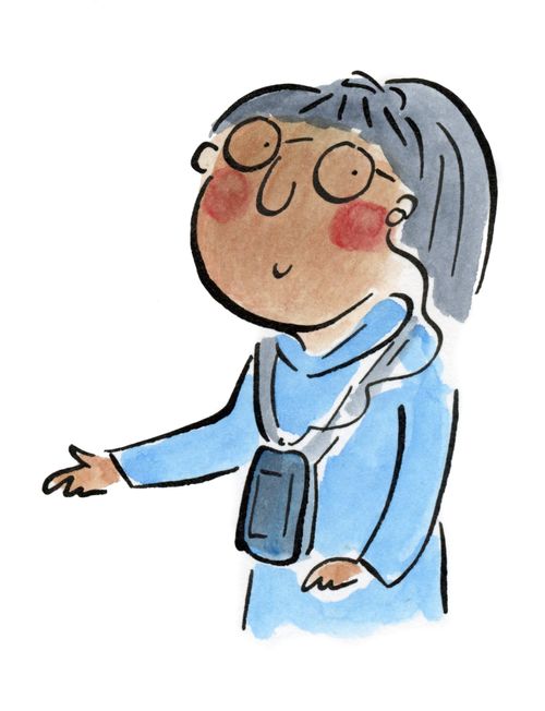 A woman listening to an audio guide