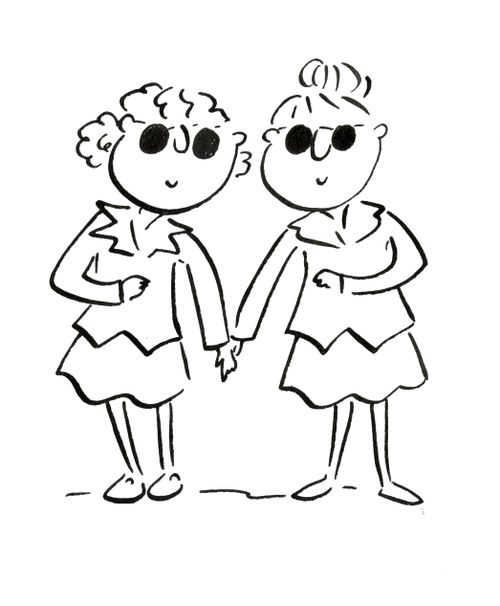 A couple holding hands and wearing sunglasses
