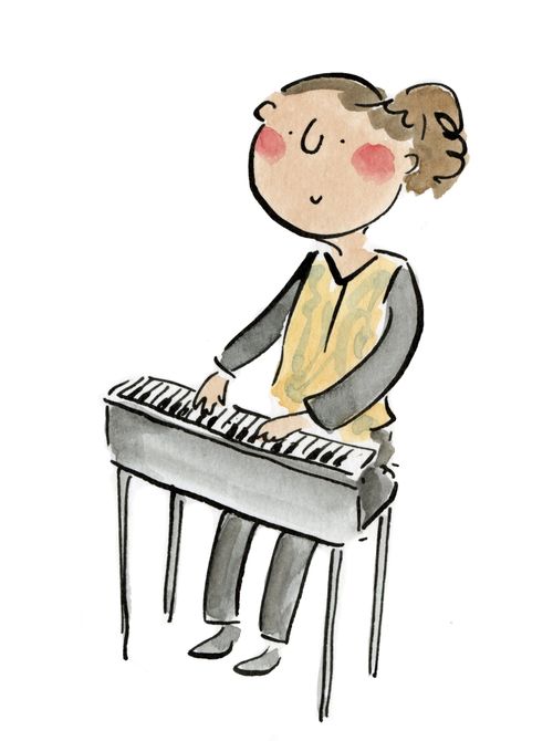 A woman playing a keyboard