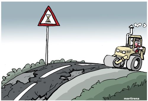 Sandtimer stuck in time measures rate at which road repairs are taking place.