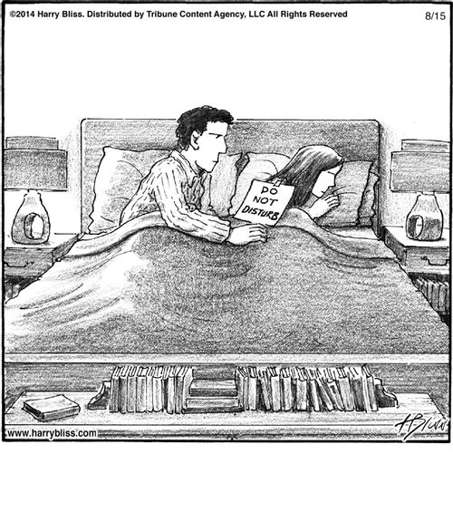 "I'm holding up a 'Do not disturb' sign in bed."