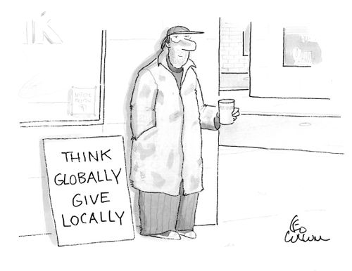 A panhandler with a sign that reads "Think globally give locally".