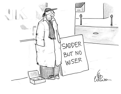 A panhandler with a sign that reads "Sadder but no wiser".