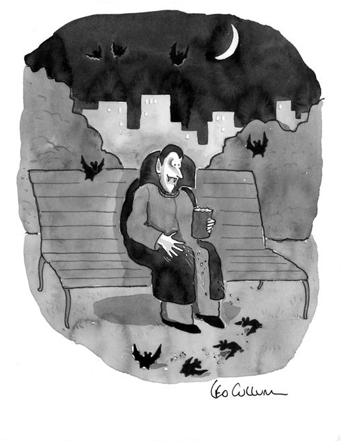 A vampire sitting on a park bench at night feeding bats.