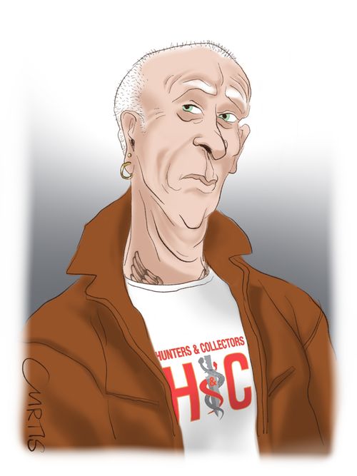 An old man wearing a band t-shirt