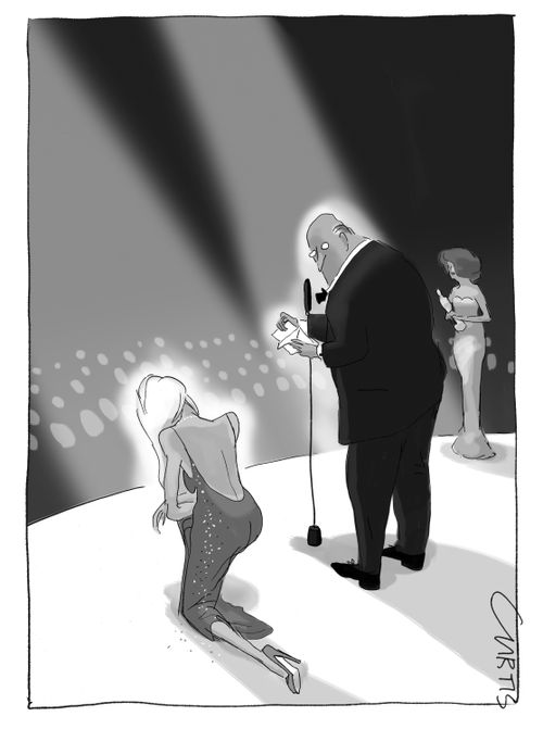 A woman bows to the crowd