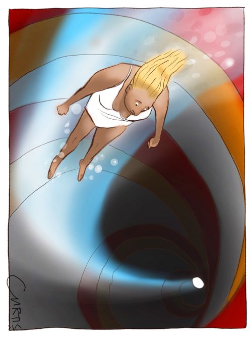 A woman glides down a water slide