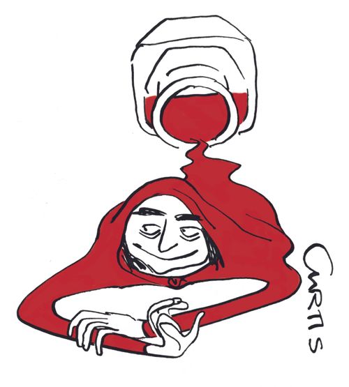 A man emerges from a red ink bottle