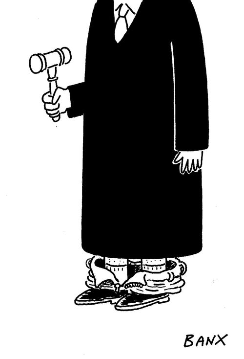 A judge with his trousers around his ankles