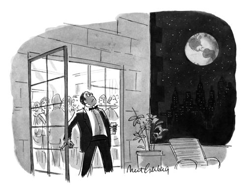 A man looks up at the earth