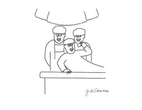 Patient takes selfie with surgeons before surgery.