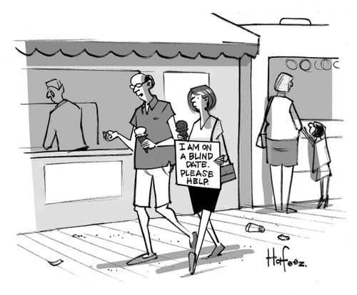 Lady walks along next to a man with sign saying 'I am on a blind date. Please help.'