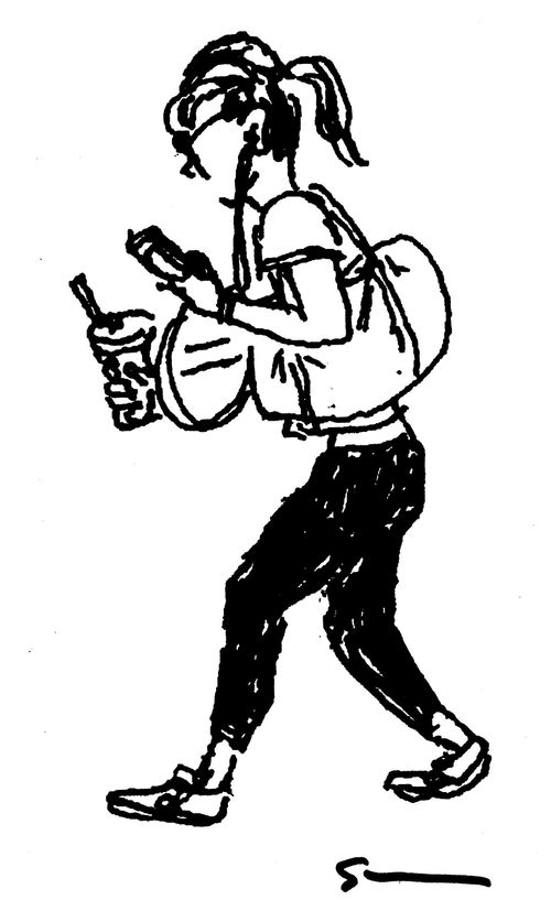 Checking phone while walking. 