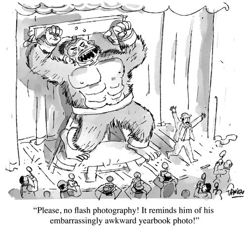 "Please, no flash photography! It reminds him of his embarrassingly awkward yearbook photo!"
