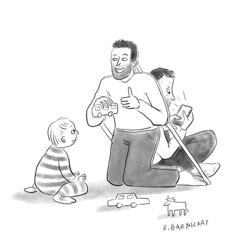 Dad pretends to play with child by hiding behind a cardboard cut-out.