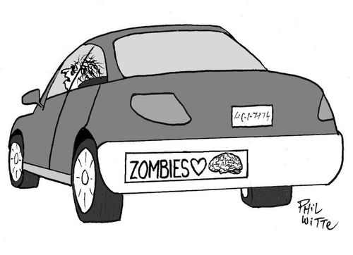 Man with sticker on card reading 'Zombies love brains'.