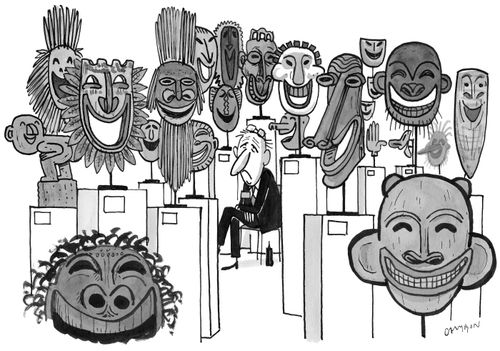 Man sat sadly amongst happy masks.