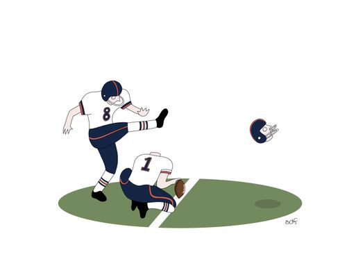 A football player accidentally kicks off the head of another football player.