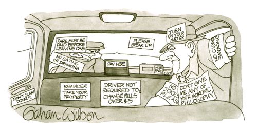 A taxi passenger climbs into the car filled with signs.