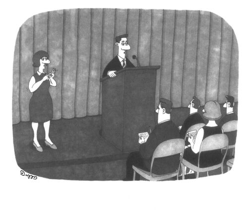 A sign language interpreter makes a dirty hand gesture.