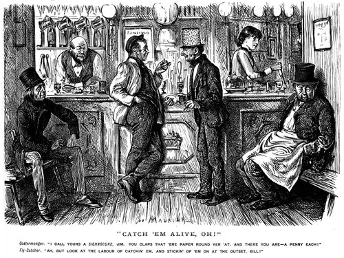 A man with fly-paper wrapped around his hat.