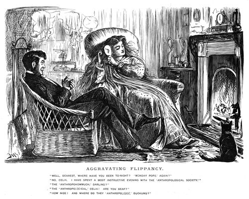 A couple sitting beside the fireplace