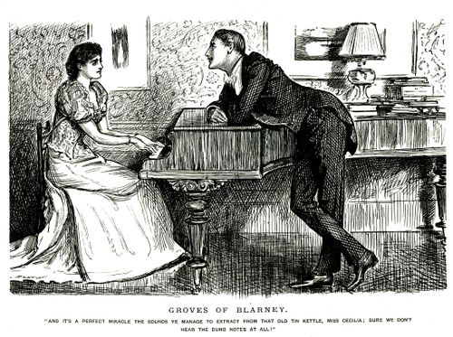 A lady playing piano and a man talking to her