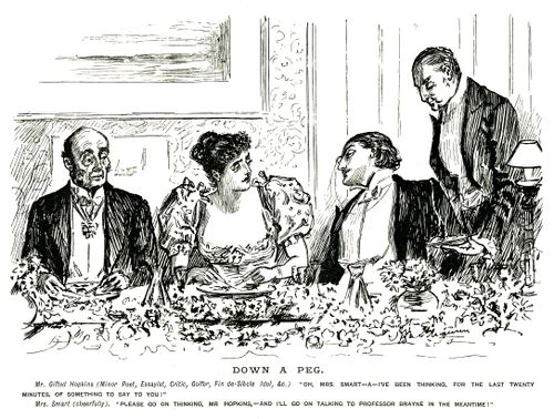Man talking to a woman at a dinner party