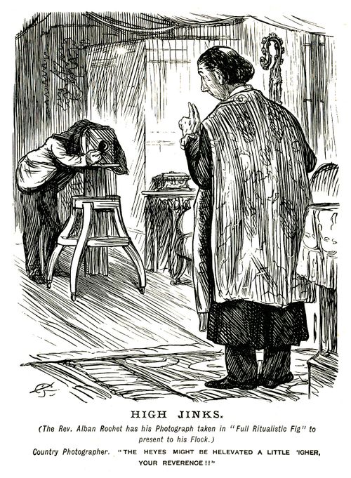 Priest being photographed in ritualistic figure