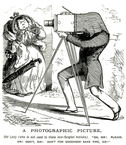 Woman mistakes a camera for a gun