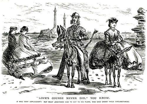 Man and woman on donkeys at the beach
