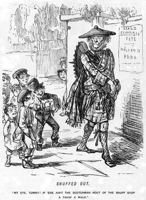 Children pointing at a Scotsman