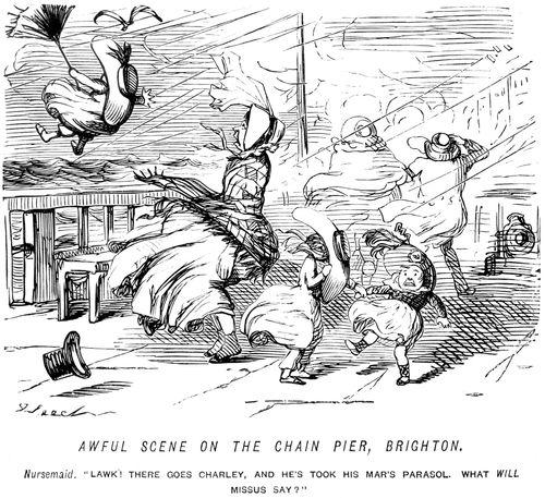 A child with a parasol is blown off the Chain Pier in Brighton