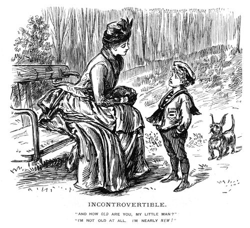 A lady talking to a boy in the park