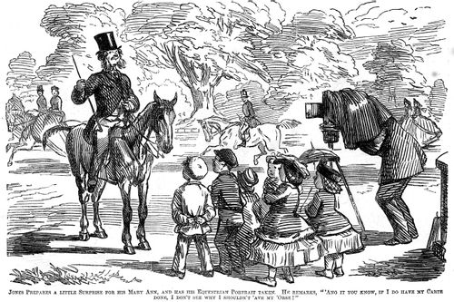 Man having his equestrian portrait taken by a photographer