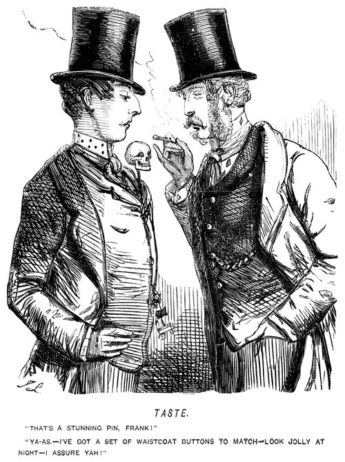 Man admiring his friend's skull topped scarf pin