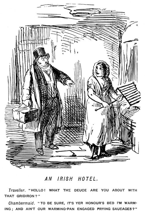 Maid using a gridiron as a warming-pan in an Irish hotel.