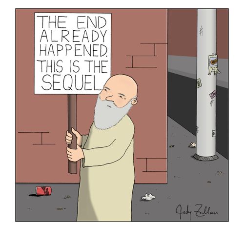 Man with sign reading 'The end already happened. This is the sequel'.
